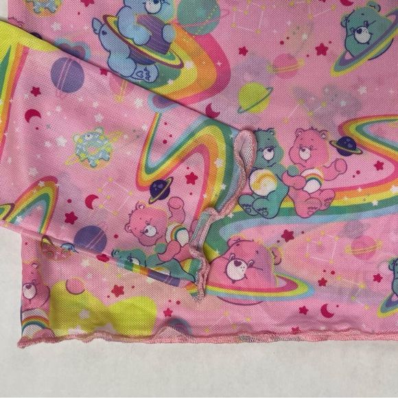 Dolls Kill x Care Bears Mesh Long Sleeve Lettuce Hem Pink Top Size Small - Picture 4 of 7